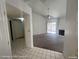 Inviting living room featuring neutral carpet, a ceiling fan, fireplace, and sliding glass door to backyard at 6512 Sterling Springs Pkwy, Las Vegas, NV 89108