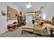 Bright bedroom with a cozy bed, shelving, and lots of decorations at 6631 Creeping Thyme St, Las Vegas, NV 89148