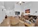 Modern living room with vaulted ceiling, clerestory windows and recessed lighting at 6631 Creeping Thyme St, Las Vegas, NV 89148