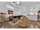 Bright living room features a vaulted ceiling, clerestory windows, and stylish decor at 6631 Creeping Thyme St, Las Vegas, NV 89148