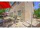 Backyard view featuring plants, fountain, bench, and lush landscape, showcasing the home's outdoor appeal at 6713 Guidestar St, North Las Vegas, NV 89084
