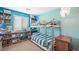 Fun bedroom featuring bunk beds, and built in shelving for storage at 6713 Guidestar St, North Las Vegas, NV 89084
