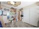 Neutral toned room featuring hardwood floors, ceiling fan and built-in shelving in room at 6713 Guidestar St, North Las Vegas, NV 89084