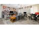 Spacious living room featuring plank flooring, neutral decor, with a piano at 6713 Guidestar St, North Las Vegas, NV 89084