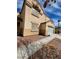 Two-story home with tan stucco and a two car garage at 6726 Montezuma Castle Ln, North Las Vegas, NV 89084