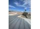 Backyard view with pool covered for the winter at 6726 Montezuma Castle Ln, North Las Vegas, NV 89084