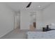 Spacious bedroom includes a ceiling fan and a large window for natural light at 6934 Alexandrite Peak St, Las Vegas, NV 89148