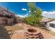 Backyard featuring a fire pit, pergola, and terraced landscaping at 71 Blaven Dr, Henderson, NV 89002