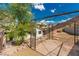 Backyard showing a pergola, fire pit, terraced landscaping and stairs at 71 Blaven Dr, Henderson, NV 89002