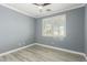 Neutral bedroom features a ceiling fan and modern window shutters at 71 Blaven Dr, Henderson, NV 89002