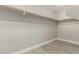 Inside a neutral walk-in closet with one rod at 71 Blaven Dr, Henderson, NV 89002