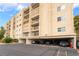 Exterior view of the condos including the underground parking, balconies, and multiple floors at 750 S Royal Crest Cir # 317, Las Vegas, NV 89169