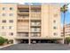 Exterior view of the condos including the underground parking, balconies, and multiple floors at 750 S Royal Crest Cir # 317, Las Vegas, NV 89169