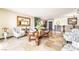 Spacious living area with tile flooring, ample seating, and decor elements at 750 S Royal Crest Cir # 317, Las Vegas, NV 89169