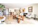 Open living room featuring tiled floors, two chairs, fireplace, and unique decor at 750 S Royal Crest Cir # 317, Las Vegas, NV 89169