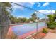 View of the community tennis court from behind the fence with a 'no smoking' sign at 750 S Royal Crest Cir # 317, Las Vegas, NV 89169