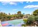 Enjoy a day playing tennis at the community tennis court with city views and blue skies at 750 S Royal Crest Cir # 317, Las Vegas, NV 89169