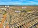 An aerial view highlighting the home's location near the Skye Canyon Community Club and shopping at 8668 Marcana St, Las Vegas, NV 89166