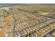 The aerial view shows the area's suburban development with many houses and planned road networks at 8668 Marcana St, Las Vegas, NV 89166