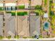 An aerial view of a home with a manicured lawn and landscaping in a well-maintained community at 8668 Marcana St, Las Vegas, NV 89166