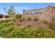 Stone Skye Mesa community entrance with lush landscaping and clear signage at 8668 Marcana St, Las Vegas, NV 89166