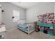 Bright ' bedroom with crib, dresser, and lots of storage space at 8668 Marcana St, Las Vegas, NV 89166