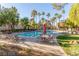 Enjoy this community pool surrounded by palm trees, patio seating, and well-manicured landscaping at 9000 Las Vegas Blvd # 1016, Las Vegas, NV 89123