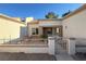 Inviting front entrance with a charming gated front yard and well-maintained desert landscaping at 9369 Villa Ridge Dr, Las Vegas, NV 89134