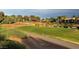 Picturesque golf course view showcasing rolling green hills, mature trees, and landscaped areas at 9369 Villa Ridge Dr, Las Vegas, NV 89134
