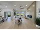 Spacious living area with modern fireplace, sleek furniture, and lots of natural light at 9369 Villa Ridge Dr, Las Vegas, NV 89134