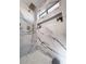 Elegant marble shower with gold fixtures and built-in shelving at 9369 Villa Ridge Dr, Las Vegas, NV 89134
