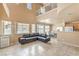 Bright, open floor plan with a staircase and a view of the kitchen and dining area at 978 Valetta Flat Ave, Las Vegas, NV 89183