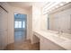Bathroom vanity featuring solid surface counters and storage space at 10321 Marymont Pl, Las Vegas, NV 89134