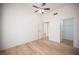 Bedroom featuring light-colored floors and two doors for easy access to other parts of the home at 10321 Marymont Pl, Las Vegas, NV 89134