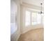 An eat-in kitchen dining nook features a chandelier and bright natural light at 10321 Marymont Pl, Las Vegas, NV 89134