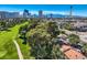 Nevada home overlooking lush green golf course with beautiful city views in the background on a bright day at 1034 Tam O Shanter, Las Vegas, NV 89109