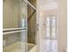 Clean bathroom featuring tile, shower, and doorway leading to another bathroom at 1034 Tam O Shanter, Las Vegas, NV 89109
