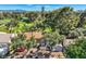 Nevada home with a private balcony overlooking lush greenery and mature trees on a sunny day at 1034 Tam O Shanter, Las Vegas, NV 89109