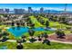Scenic golf course featuring a beautiful blue lake and meticulously maintained green, framed by mature trees at 1034 Tam O Shanter, Las Vegas, NV 89109