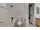 Bright bathroom with a shower-tub combination and tiled floor at 10530 Eagle Nest St, Las Vegas, NV 89141