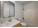 Bathroom featuring a shower-tub combination, framed mirror, modern vanity, and countertop at 10530 Eagle Nest St, Las Vegas, NV 89141