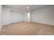A bright, expansive bedroom features neutral carpeting and recessed lighting for versatile decorating options at 10530 Eagle Nest St, Las Vegas, NV 89141