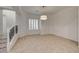 Bright dining room with plantation shutters and modern light fixture at 10530 Eagle Nest St, Las Vegas, NV 89141