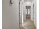 Hallway featuring carpet flooring and doors leading to various rooms at 10530 Eagle Nest St, Las Vegas, NV 89141