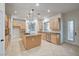 Modern kitchen with stainless steel appliances and a center island at 10530 Eagle Nest St, Las Vegas, NV 89141