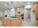 Stylish kitchen island with pendant lighting and stainless steel appliances at 10530 Eagle Nest St, Las Vegas, NV 89141