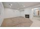 Spacious living room features a fireplace, plush carpet, and plantation shutters at 10530 Eagle Nest St, Las Vegas, NV 89141