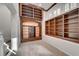 Cozy loft with custom bookshelves, carpet, and natural light from window at 10530 Eagle Nest St, Las Vegas, NV 89141