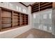 Second story loft with custom wood bookshelves and wrought iron railing at 10530 Eagle Nest St, Las Vegas, NV 89141