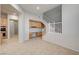 Staircase near the kitchen area and a built-in desk at 10530 Eagle Nest St, Las Vegas, NV 89141